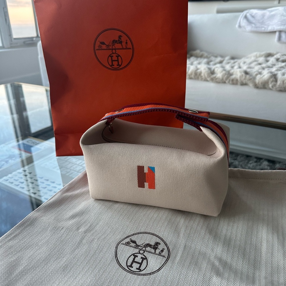 Hermes Cream Clutch with Multicolor Accent